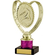 Gold Dance Trophy on Pink Tower
